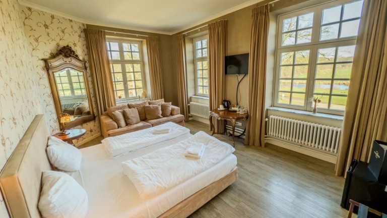 Deluxe suite met tuinzicht - Kasteel Pietersheim