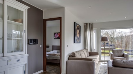 Woonkamer - Roompot Eifelpark Kronenburger See Woonkamer - Roompot Eifelpark Kronenburger See