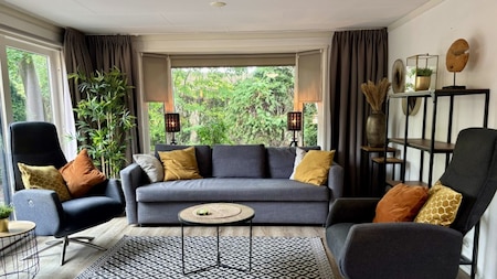 Woonkamer - Bungalowpark Het Verscholen Dorp