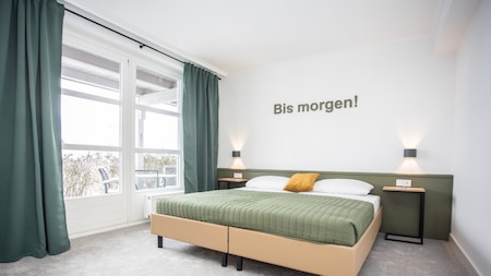 Slaapkamer - UplandParcs Bergresidence Slaapkamer - UplandParcs Bergresidence