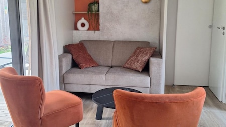 Woonkamer - RCN Vakantiepark de Noordster