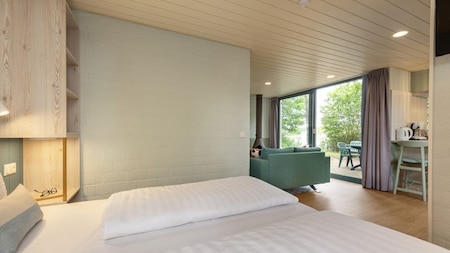 Woon-slaapkamer - Center Parcs De Huttenheugte Woon-slaapkamer - Center Parcs De Huttenheugte