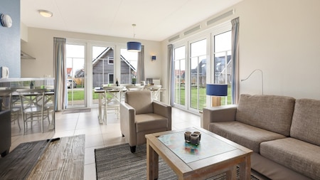 Woonkamer - Dormio Strand Resort Nieuwvliet-Bad