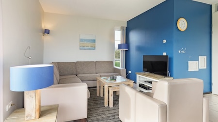Woonkamer - Dormio Strand Resort Nieuwvliet-Bad