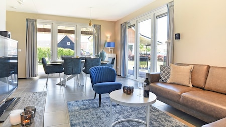 Woonkamer - Dormio Strand Resort Nieuwvliet-Bad