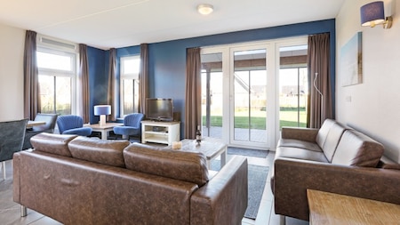 Woonkamer - Dormio Strand Resort Nieuwvliet-Bad