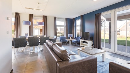 Woonkamer - Dormio Strand Resort Nieuwvliet-Bad