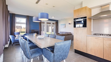 Woonkamer - Dormio Strand Resort Nieuwvliet-Bad