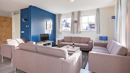 Woonkamer - Dormio Strand Resort Nieuwvliet-Bad