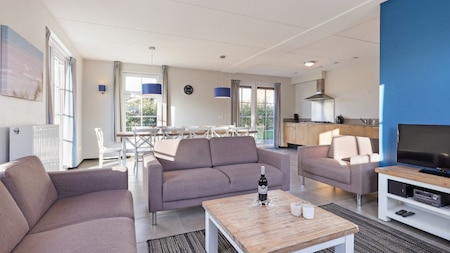 Woonkamer - Dormio Strand Resort Nieuwvliet-Bad