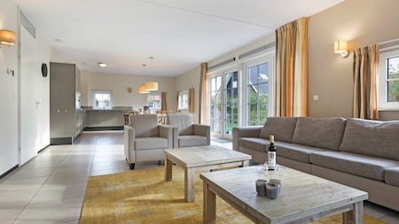 Woonkamer - Dormio Strand Resort Nieuwvliet-Bad