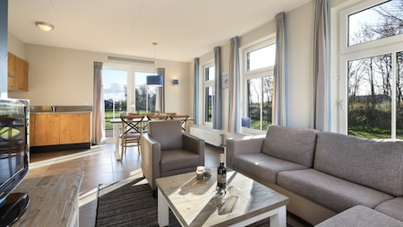 Woonkamer - Dormio Strand Resort Nieuwvliet-Bad