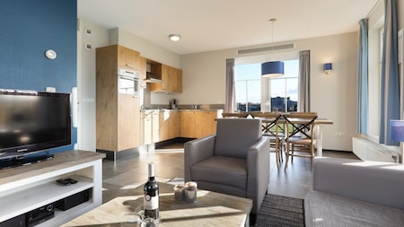 Woonkamer - Dormio Strand Resort Nieuwvliet-Bad