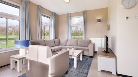 Woonkamer - Dormio Strand Resort Nieuwvliet-Bad