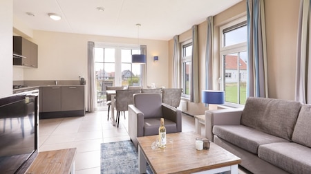 Woonkamer - Dormio Strand Resort Nieuwvliet-Bad