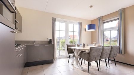 Woonkamer - Dormio Strand Resort Nieuwvliet-Bad