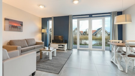 Woonkamer - Dormio Strand Resort Nieuwvliet-Bad