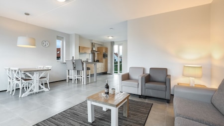 Woonkamer - Dormio Strand Resort Nieuwvliet-Bad