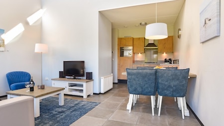 Woonkamer - Dormio Strand Resort Nieuwvliet-Bad