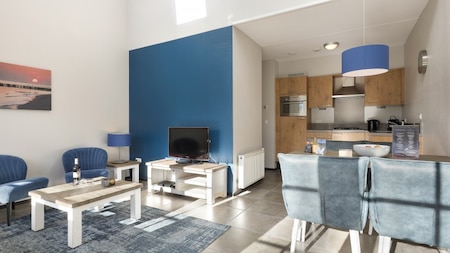 Woonkamer - Dormio Strand Resort Nieuwvliet-Bad