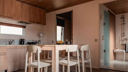 Woonkamer en keuken - RCN Vakantiepark Toppershoedje