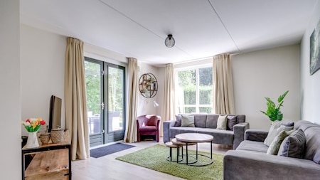 Woonkamer - Vakantiepark 't Broeckhuys Woonkamer - Vakantiepark 't Broeckhuys