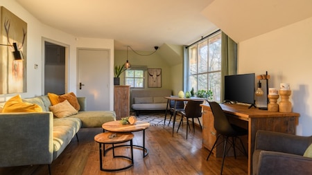 Woonkamer - Summio Bungalowpark Herperduin