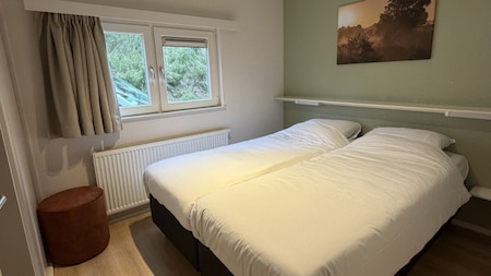 Slaapkamer - RCN Vakantiepark  De Roggeberg