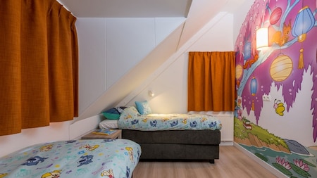 Slaapkamer - Familie Resort De Tovertuin