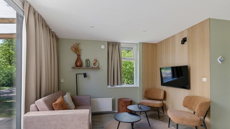 Woonkamer - RCN Vakantiepark De Roggeberg Woonkamer - RCN Vakantiepark De Roggeberg
