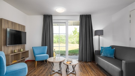 Woonkamer - Landal Résidence Klein Vink Woonkamer - Landal Résidence Klein Vink