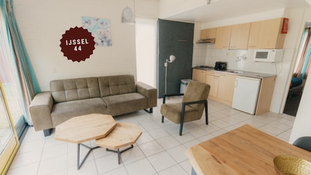 Woonkamer - Vakantiepark Sallandshoeve Woonkamer - Vakantiepark Sallandshoeve