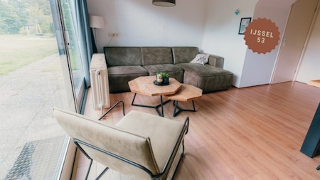 Woonkamer - Vakantiepark Sallandshoeve Woonkamer - Vakantiepark Sallandshoeve