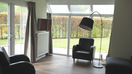 Woonkamer - Vakantiepark Sallandshoeve Woonkamer - Vakantiepark Sallandshoeve