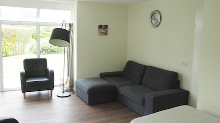 Woonkamer - Vakantiepark Sallandshoeve Woonkamer - Vakantiepark Sallandshoeve