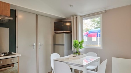 Woonkamer en keuken - Siblu Meerwijck Woonkamer en keuken - Siblu Meerwijck