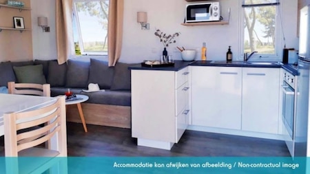 Woonkamer en keuken - Siblu de Oase Woonkamer en keuken - Siblu de Oase
