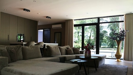 Woonkamer - Vakantiepark Breebronne Woonkamer - Vakantiepark Breebronne