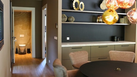 Woonkamer en hal - Vakantiepark Breebronne Woonkamer en hal - Vakantiepark Breebronne
