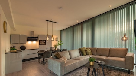 Woonkamer - Vakantiepark Breebronne Woonkamer - Vakantiepark Breebronne