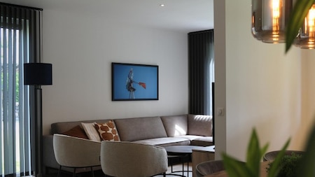 Woonkamer - Vakantiepark Breebronne Woonkamer - Vakantiepark Breebronne