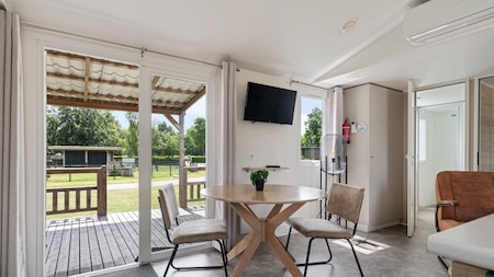 Woonkamer - RCN Vakantiepark Zeewolde Woonkamer - RCN Vakantiepark Zeewolde