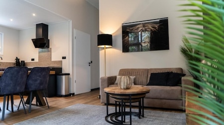 Woonkamer - Vakantiepark De Rimboe en De Woeste Hoogte