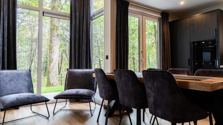 Woonkamer - Vakantiepark De Rimboe en De Woeste Hoogte