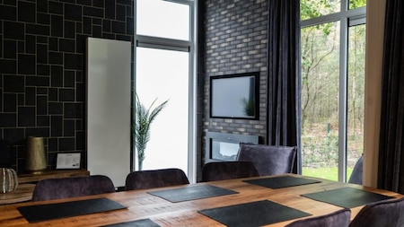 Woonkamer - Vakantiepark De Rimboe en De Woeste Hoogte