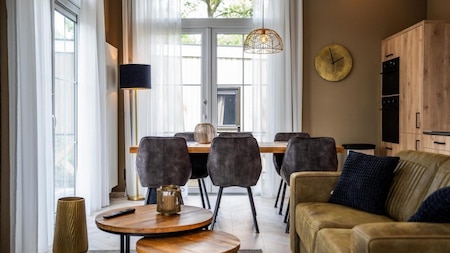 Woonkamer - Vakantiepark De Rimboe en De Woeste Hoogte