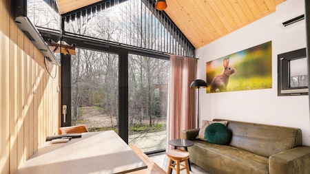 Woonkamer - Vakantiehoeve Si-Es-An Woonkamer - Vakantiehoeve Si-Es-An
