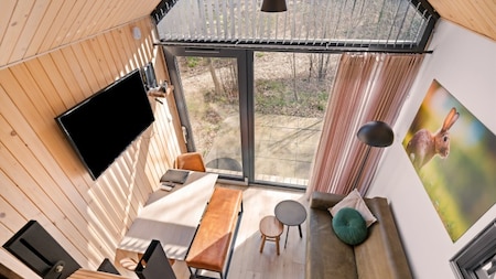 Woonkamer - Vakantiehoeve Si-Es-An Woonkamer - Vakantiehoeve Si-Es-An