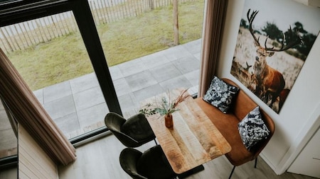 Woonkamer - Vakantiehoeve Si-Es-An Woonkamer - Vakantiehoeve Si-Es-An
