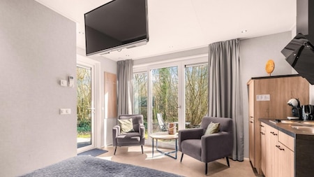 Woonkamer - Vakantiehoeve Si-Es-An Woonkamer - Vakantiehoeve Si-Es-An